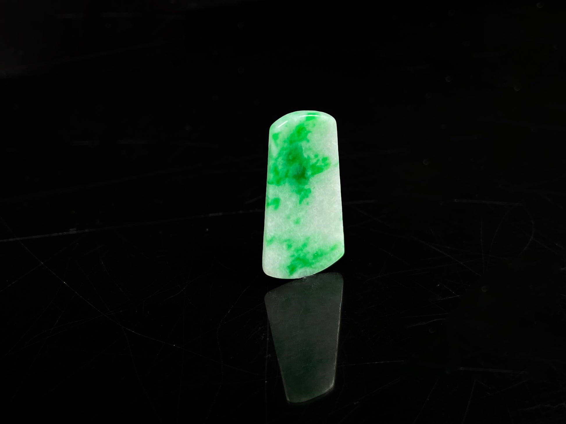 A creamy white Yang Green Wu Shi Pai  loose jadeite.