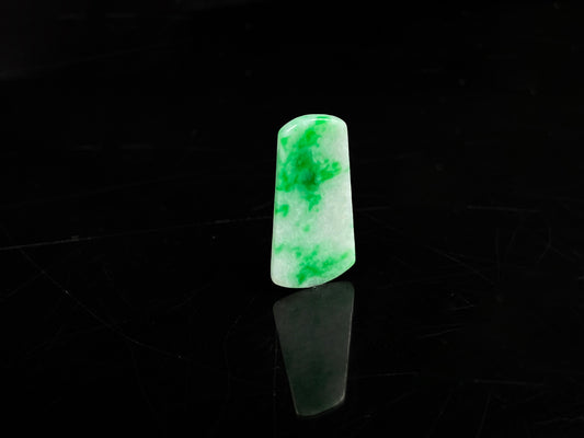 A creamy white Yang Green Wu Shi Pai  loose jadeite.