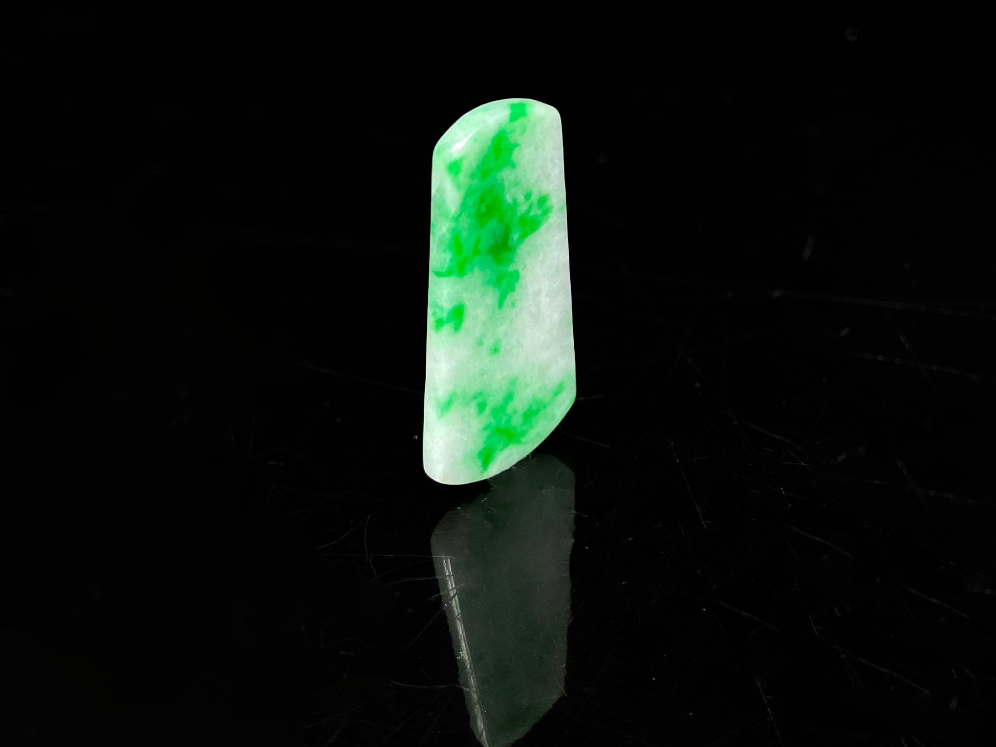 A creamy white Yang Green Wu Shi Pai  loose jadeite.
