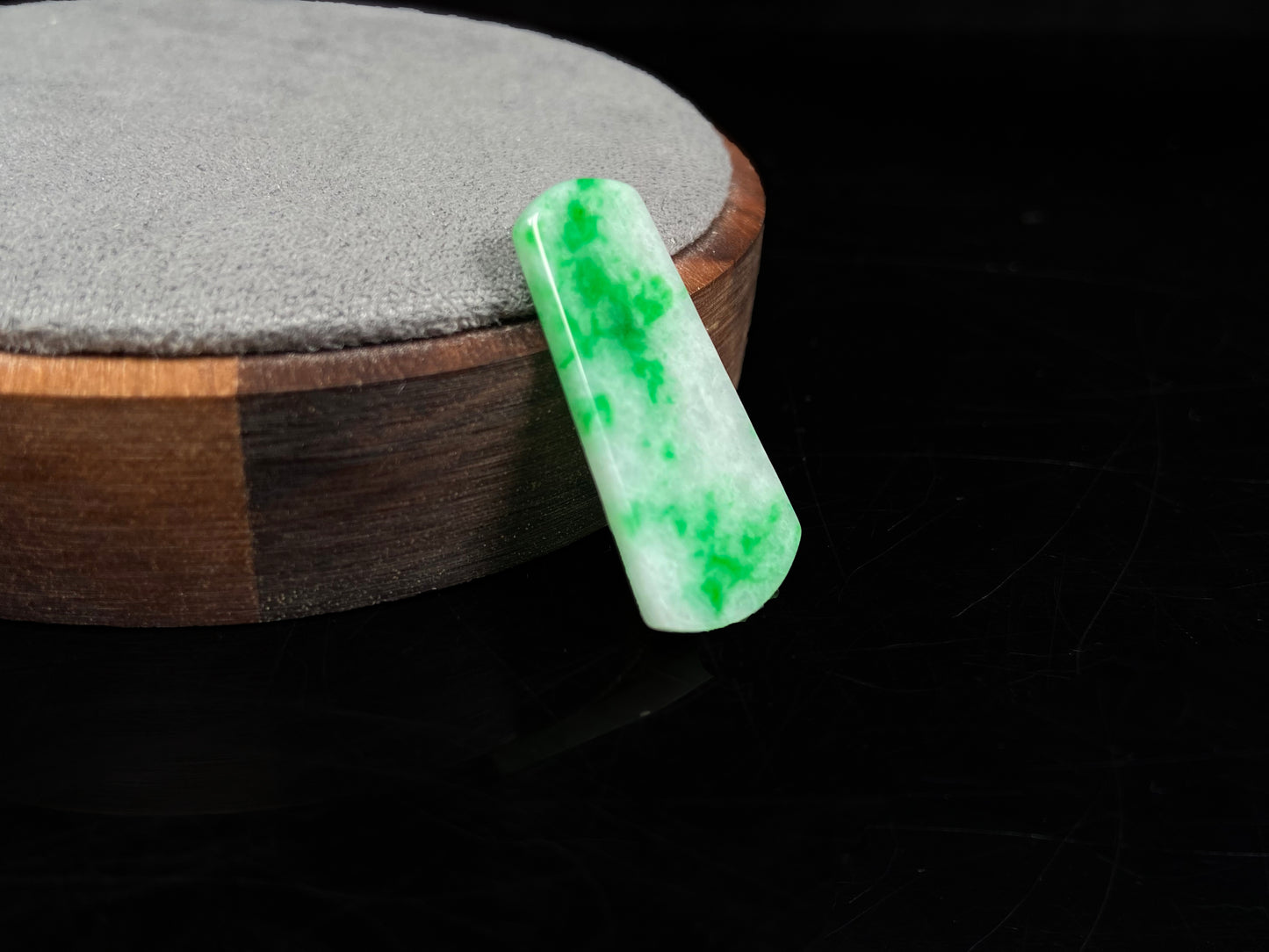 A creamy white Yang Green Wu Shi Pai  loose jadeite.