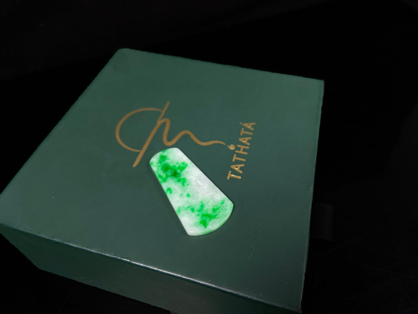 A creamy white Yang Green Wu Shi Pai  loose jadeite.