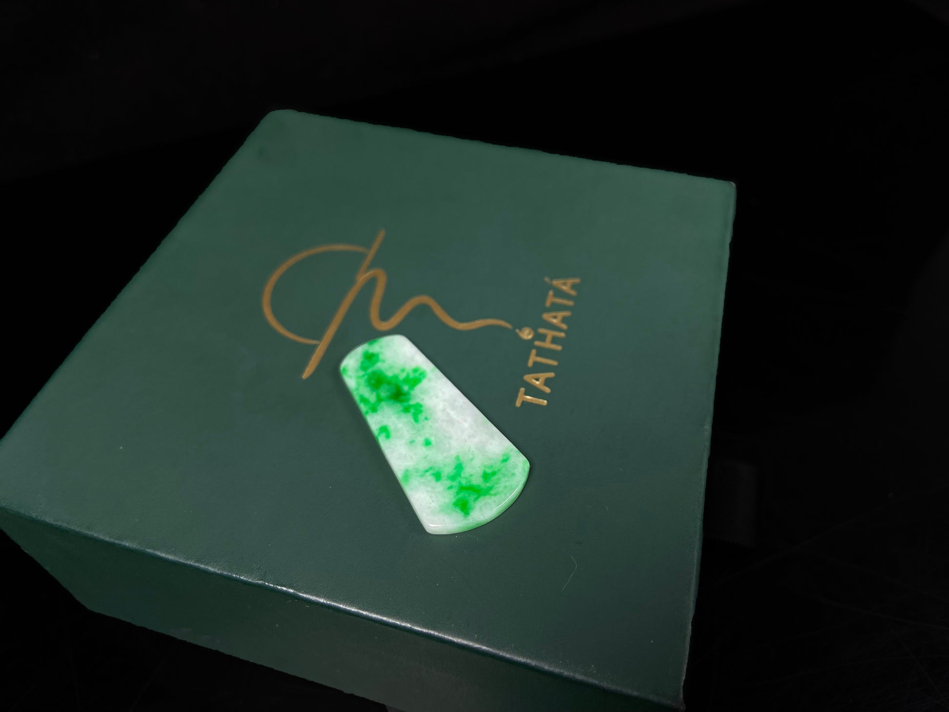 A creamy white Yang Green Wu Shi Pai  loose jadeite.