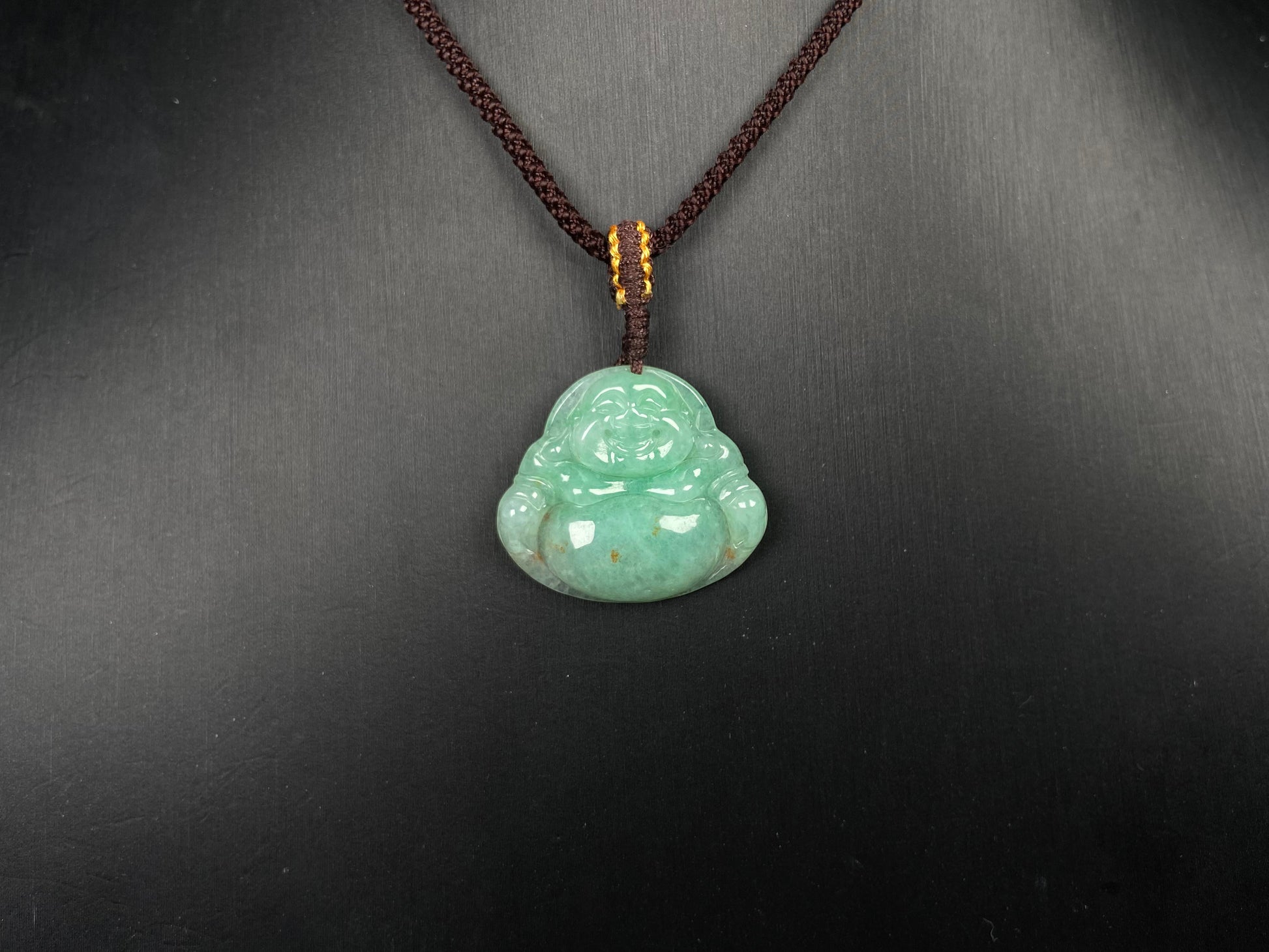 A apple green Maitreya Buddha loose jadeite.