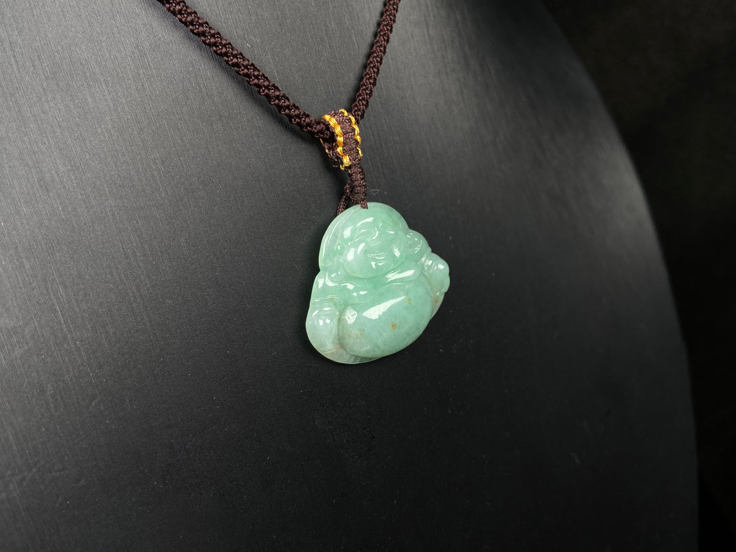 A apple green Maitreya Buddha loose jadeite.