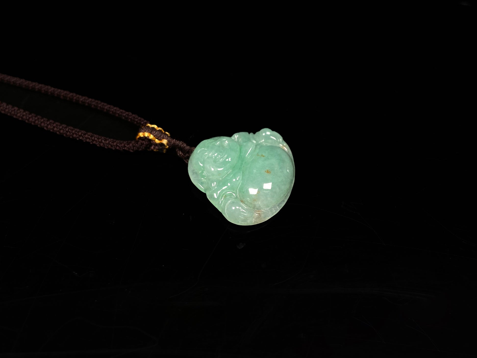 A apple green Maitreya Buddha loose jadeite.