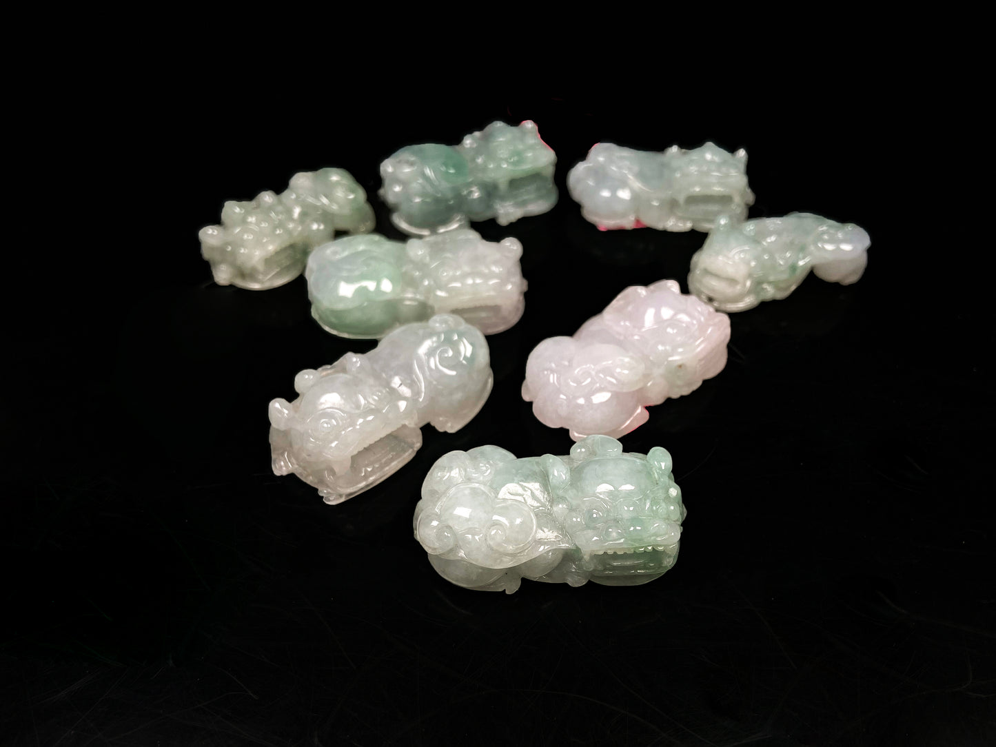 A white green Overlord Pixiu loose jadeite group.