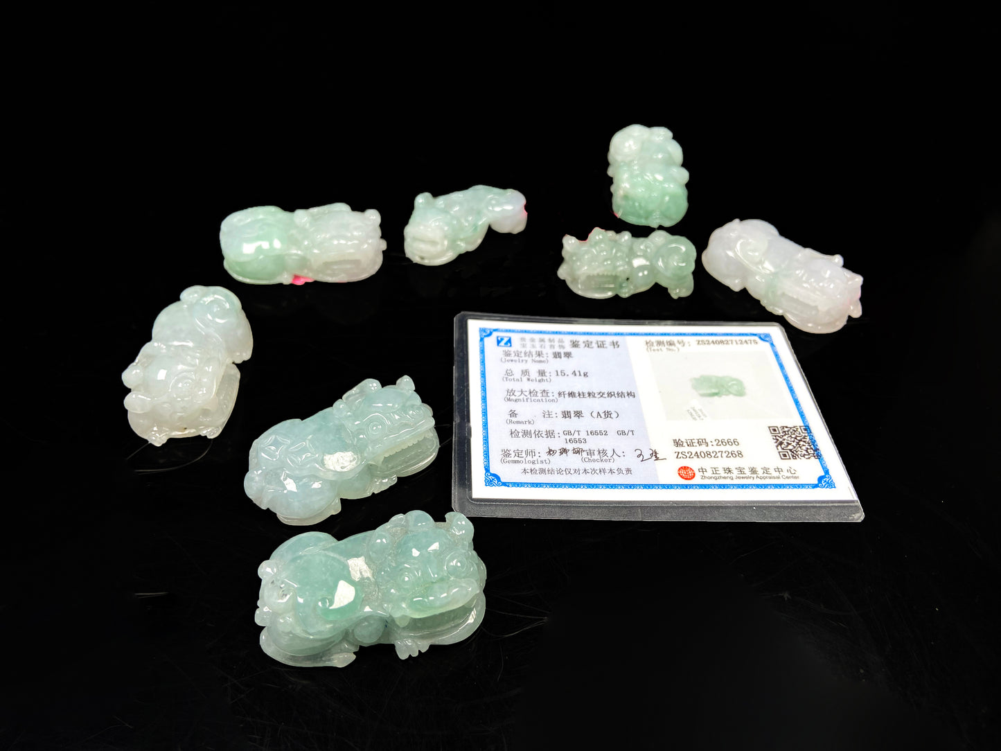 A white green Overlord Pixiu loose jadeite group.