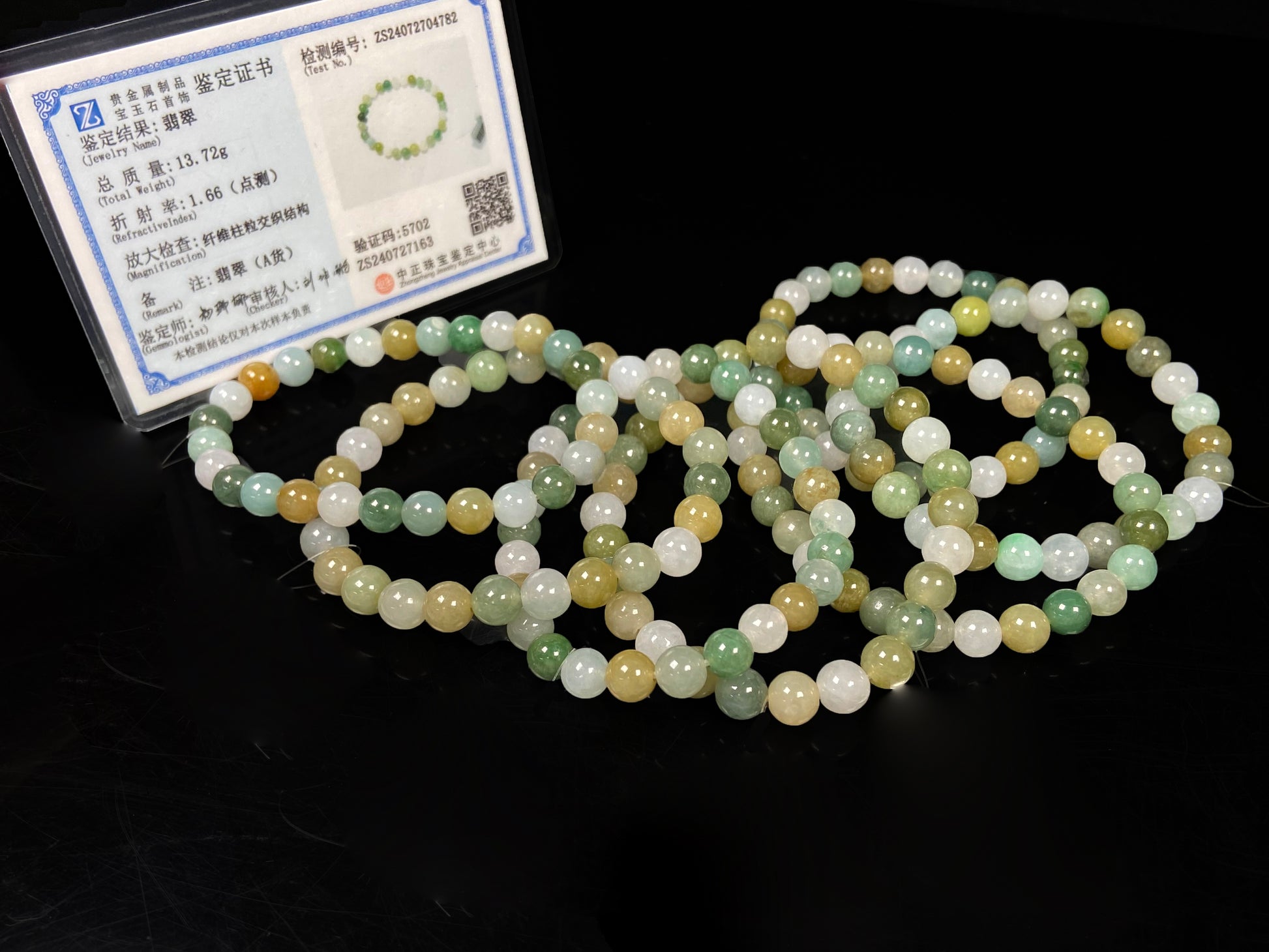 A pastel green mix jadeite beads bracelet group.