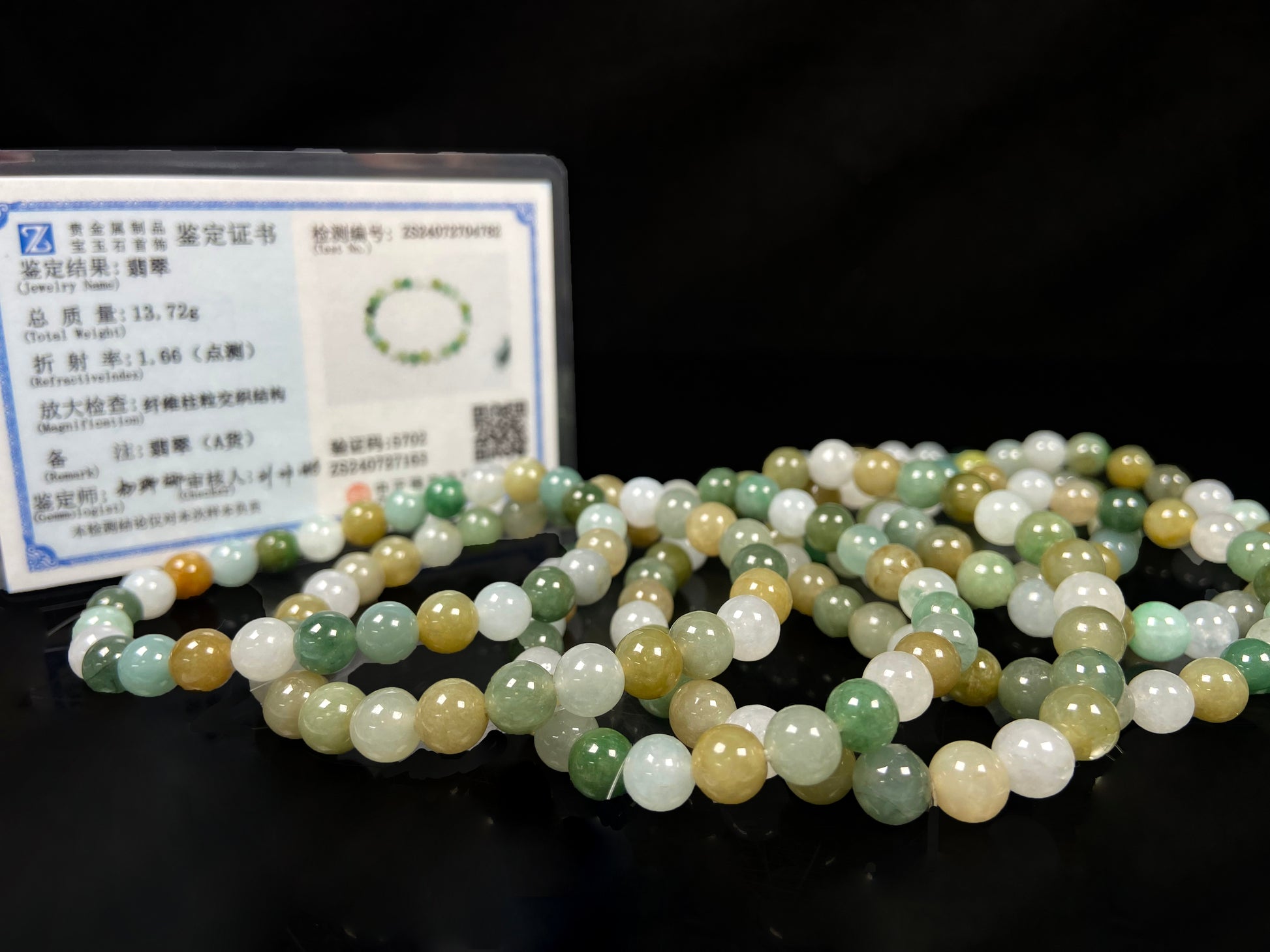 A pastel green mix jadeite beads bracelet group.