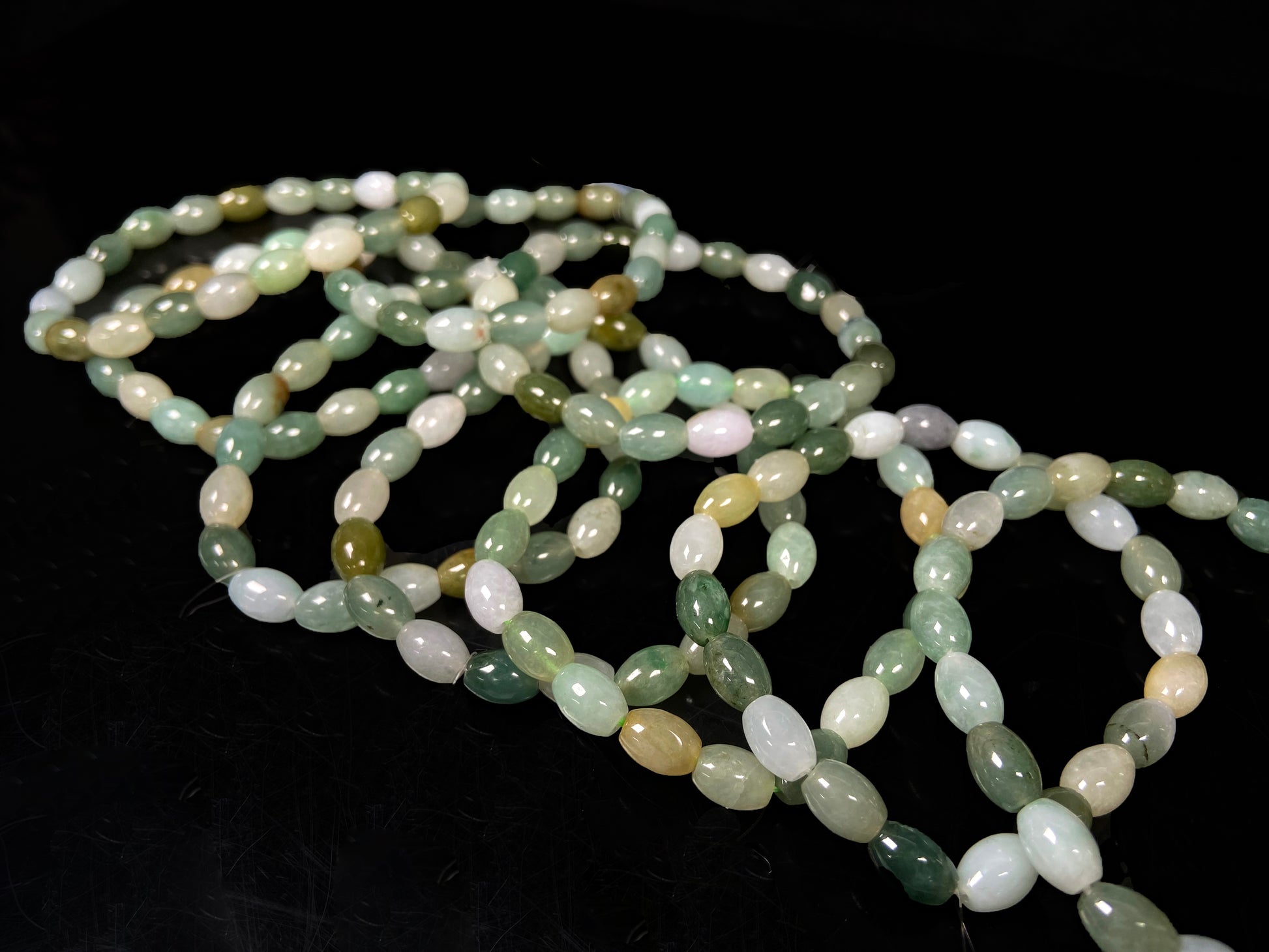 A spring green vitality jadeite beads bracelet group.