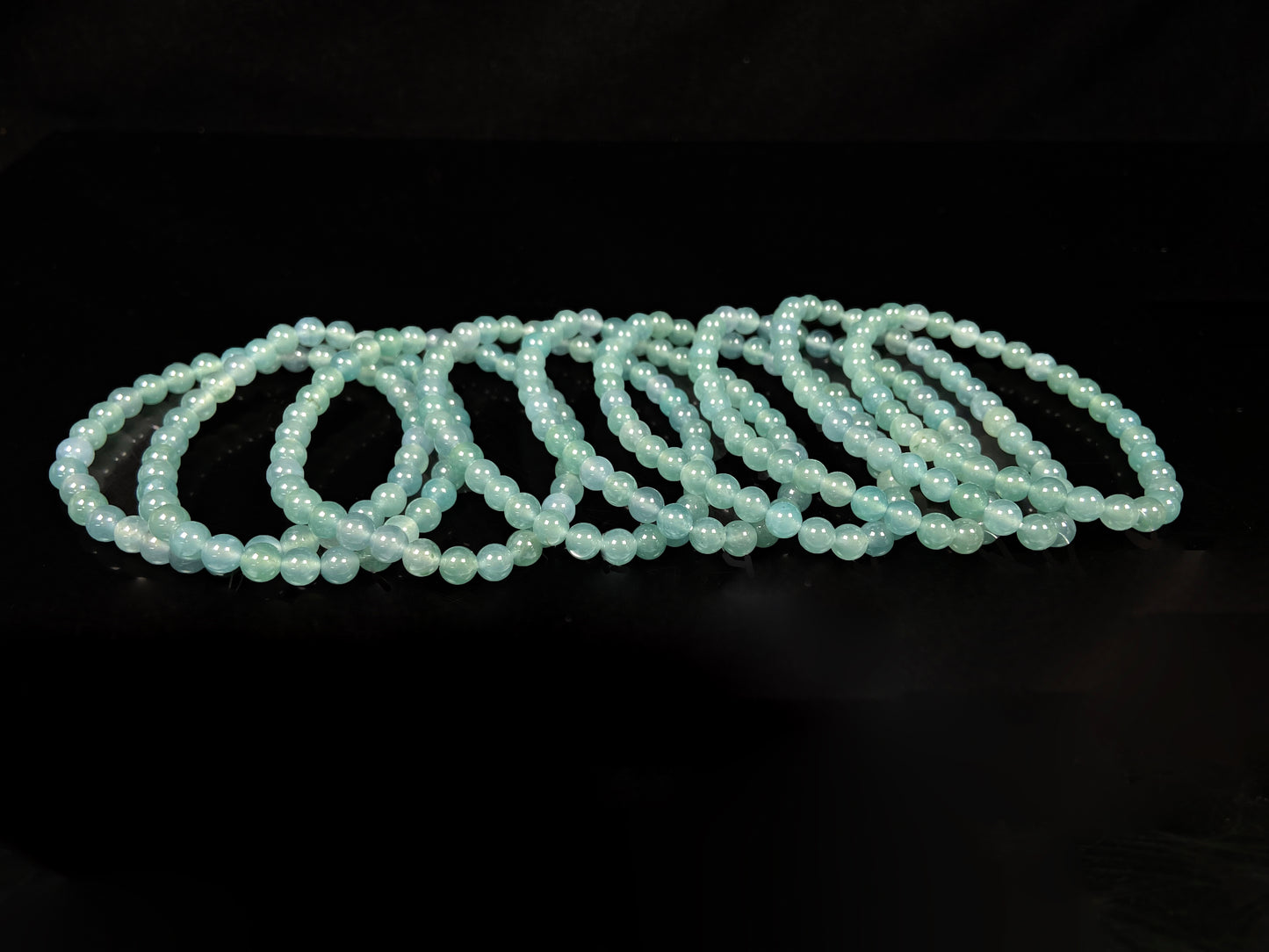 A icy blue repose jadeite beads bracelet group.