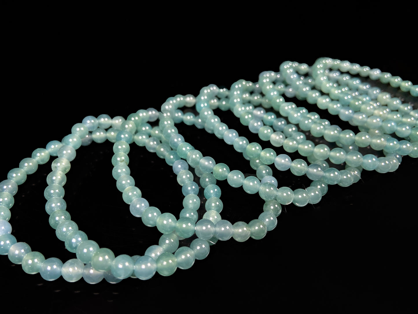 A icy blue repose jadeite beads bracelet group.