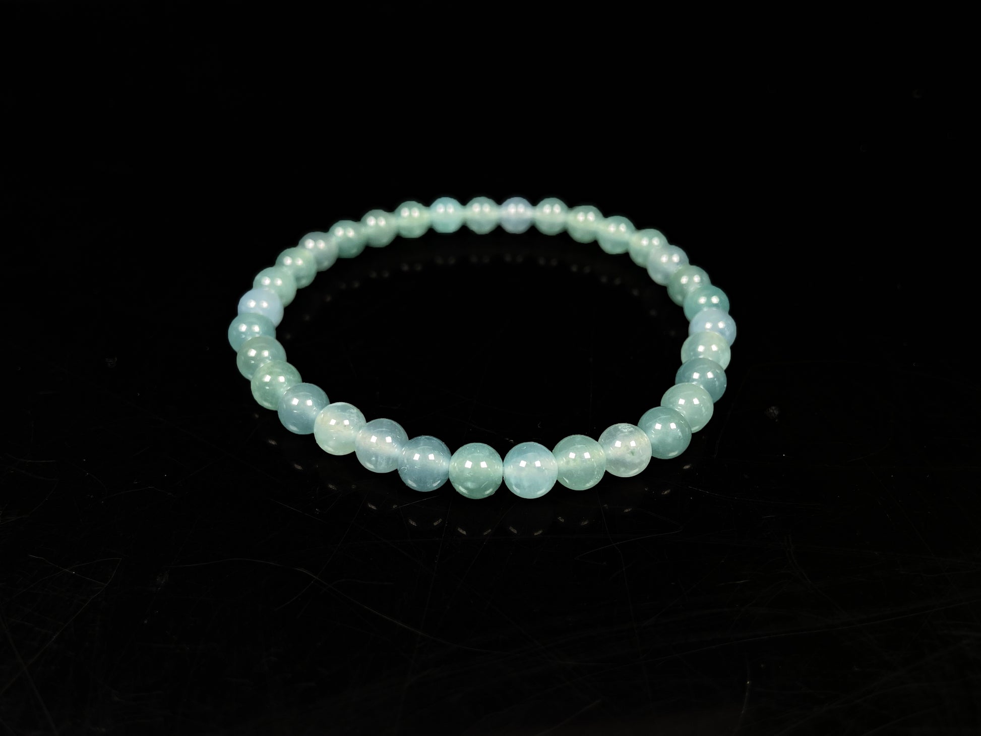 A icy blue repose jadeite beads bracelet.