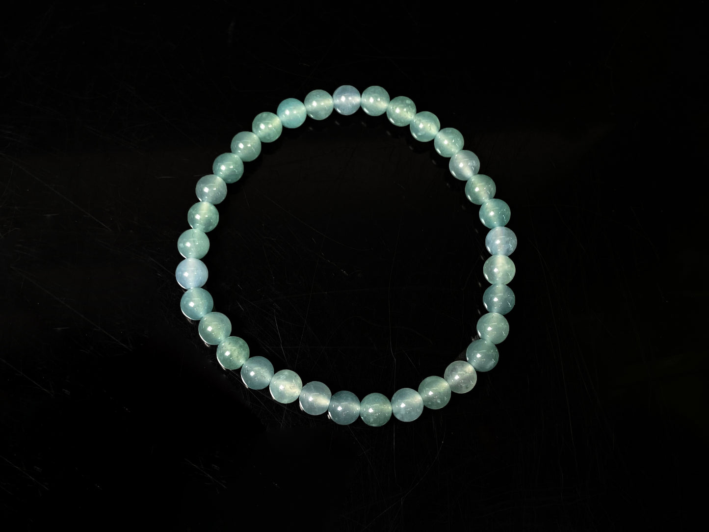 A icy blue repose jadeite beads bracelet.
