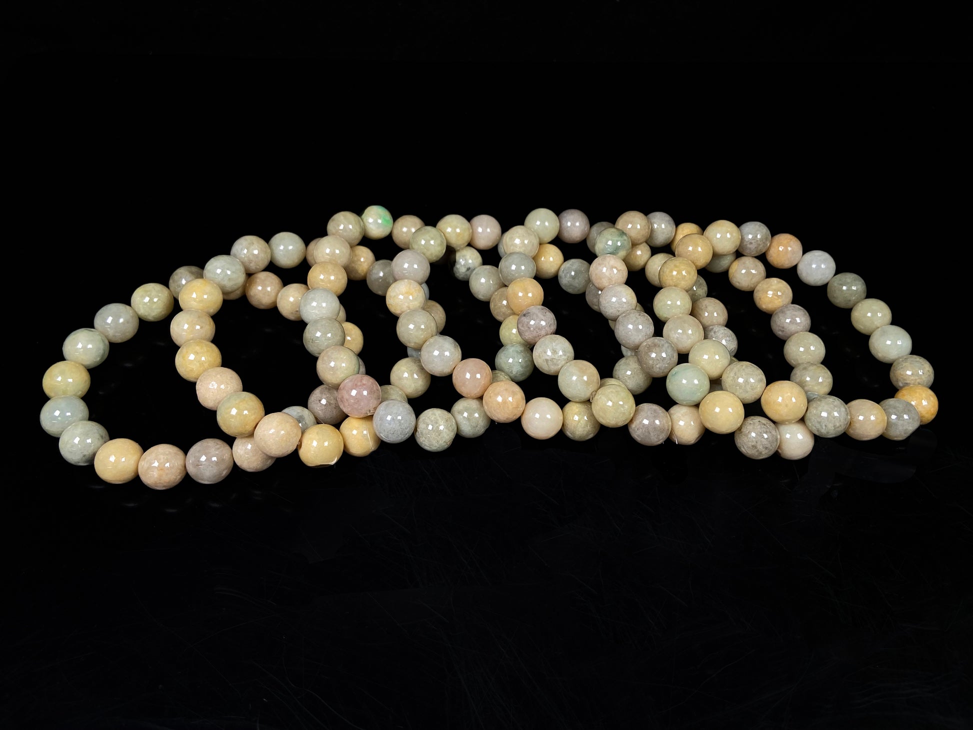 A honeyed oat ash green mix jadeite beads bracelet.