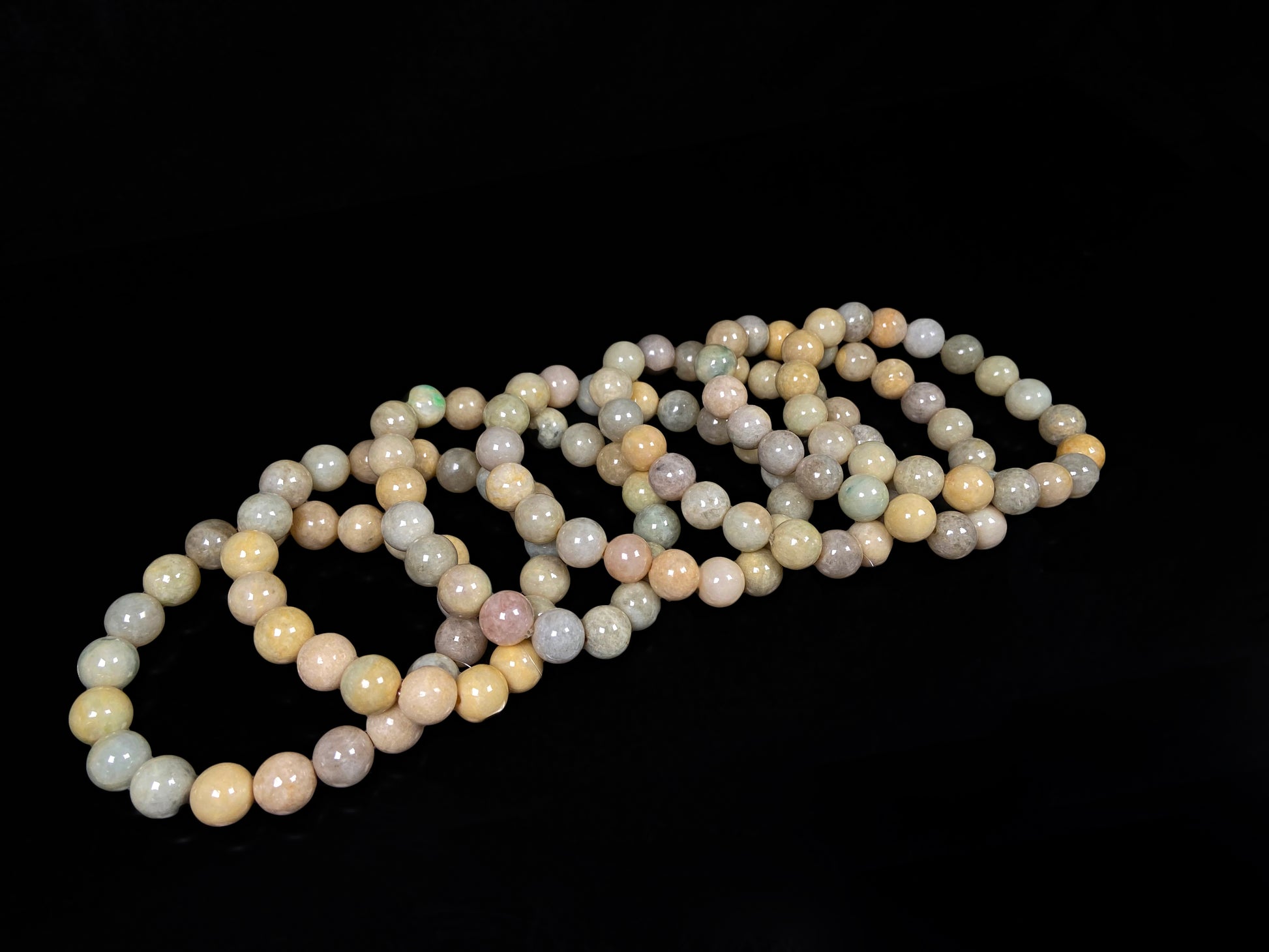 A honeyed oat ash green mix jadeite beads bracelet.