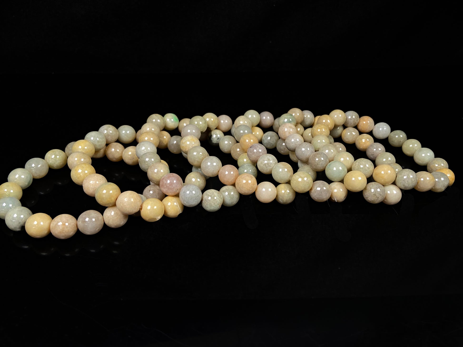 A honeyed oat ash green mix jadeite beads bracelet.
