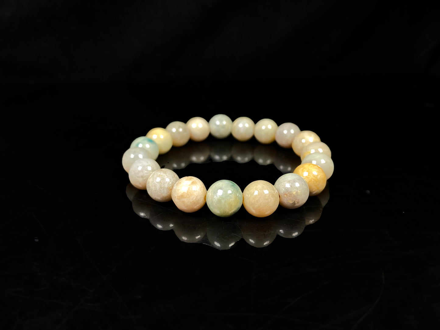 A honeyed oat ash green mix jadeite beads bracelet.