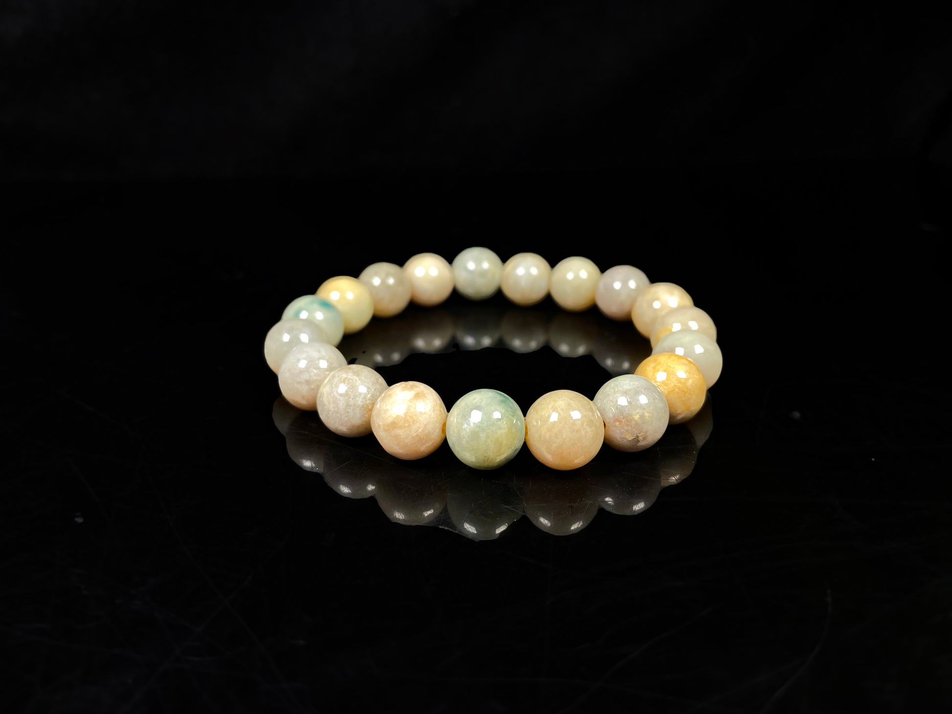 A honeyed oat ash green mix jadeite beads bracelet.