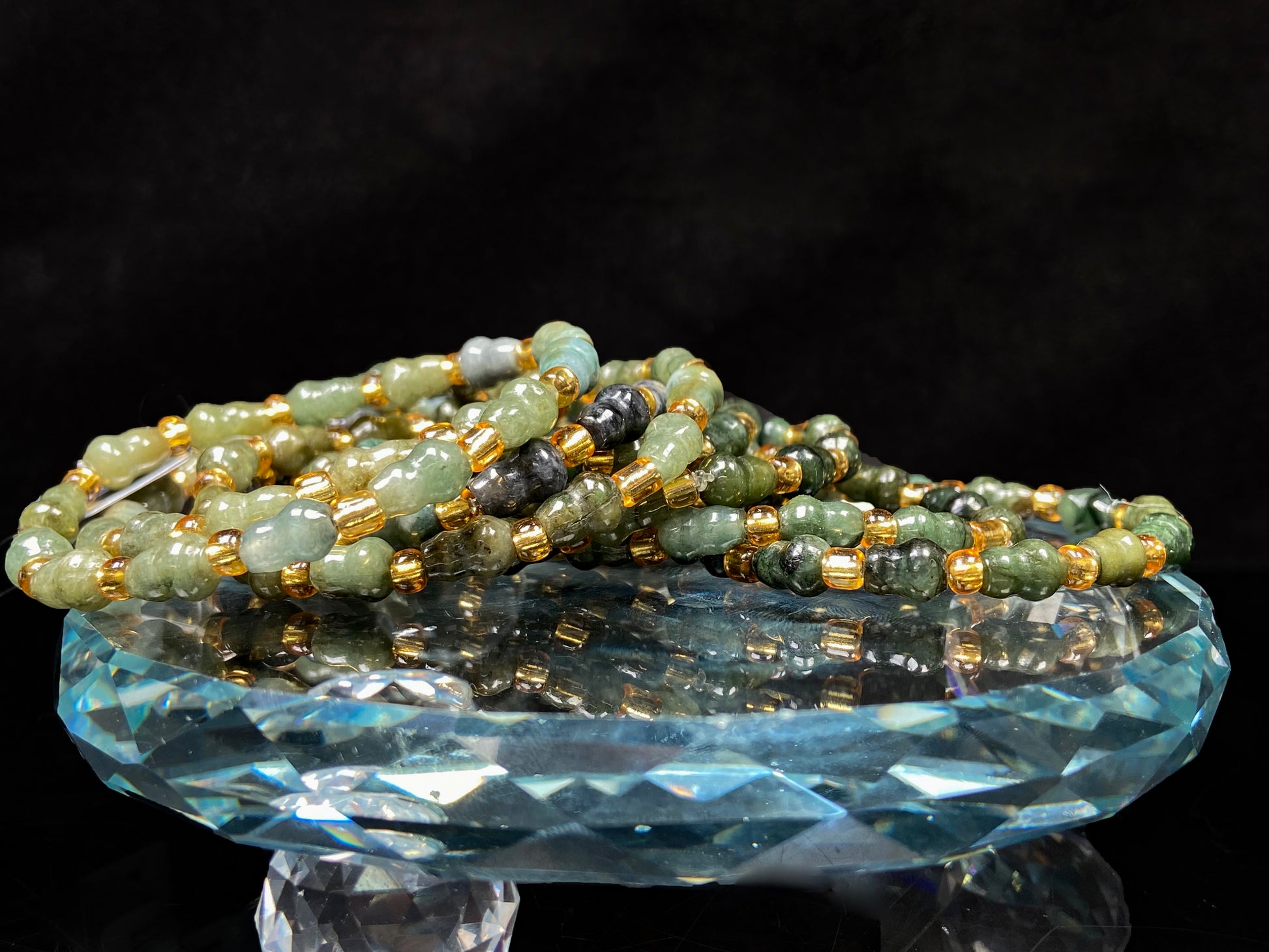 A green hue gourd beads jadeite beads bracelet group.
