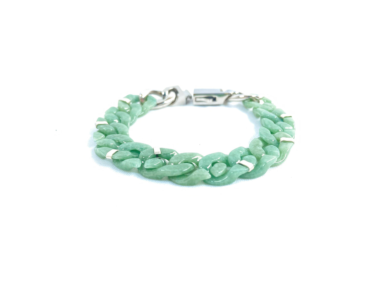 A Cuban chain bracelet made of aqua green jadeite.