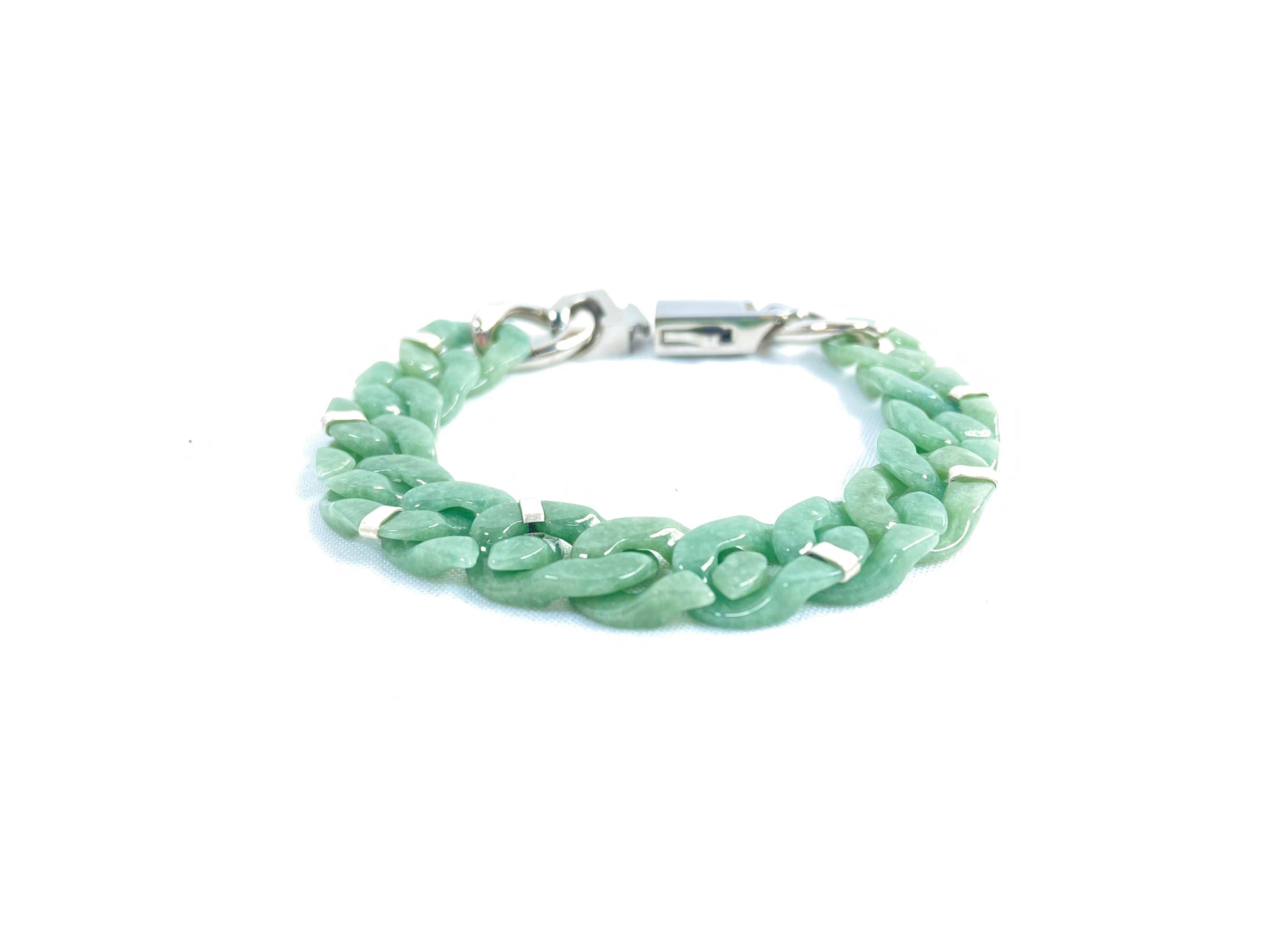 A Cuban chain bracelet made of aqua green jadeite.