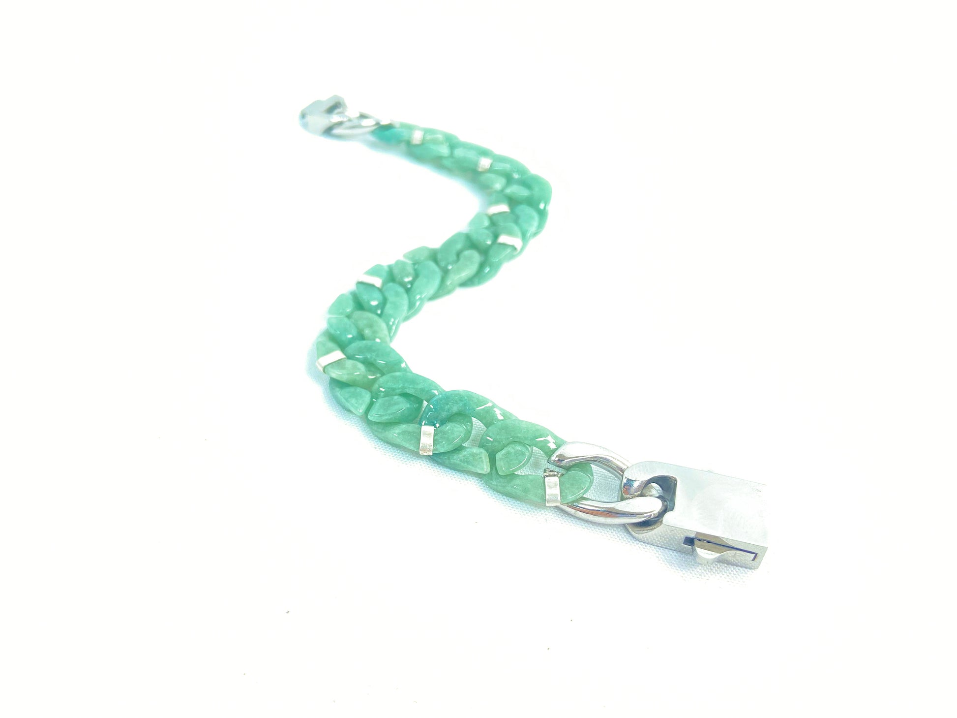 A Cuban chain bracelet made of aqua green jadeite.