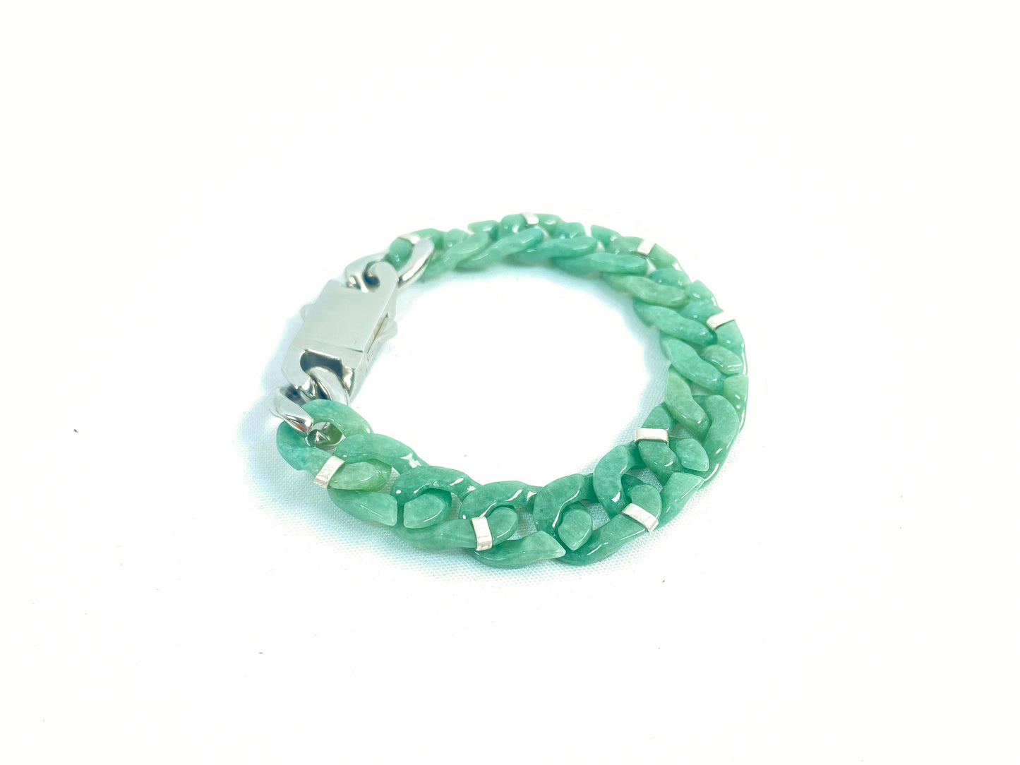 A Cuban chain bracelet made of aqua green jadeite.
