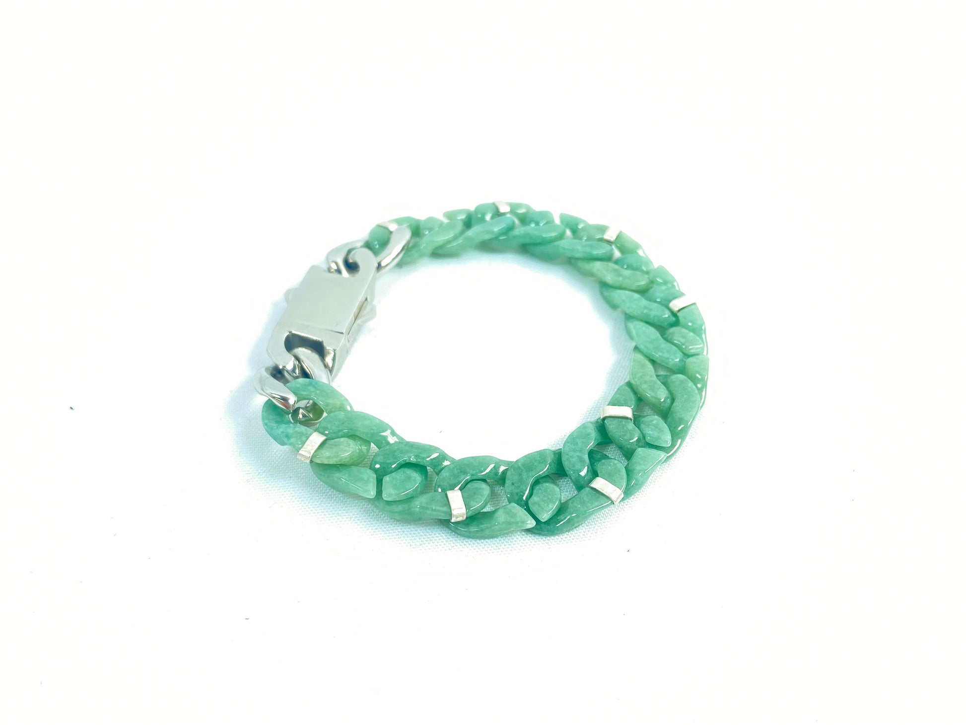 A Cuban chain bracelet made of aqua green jadeite.