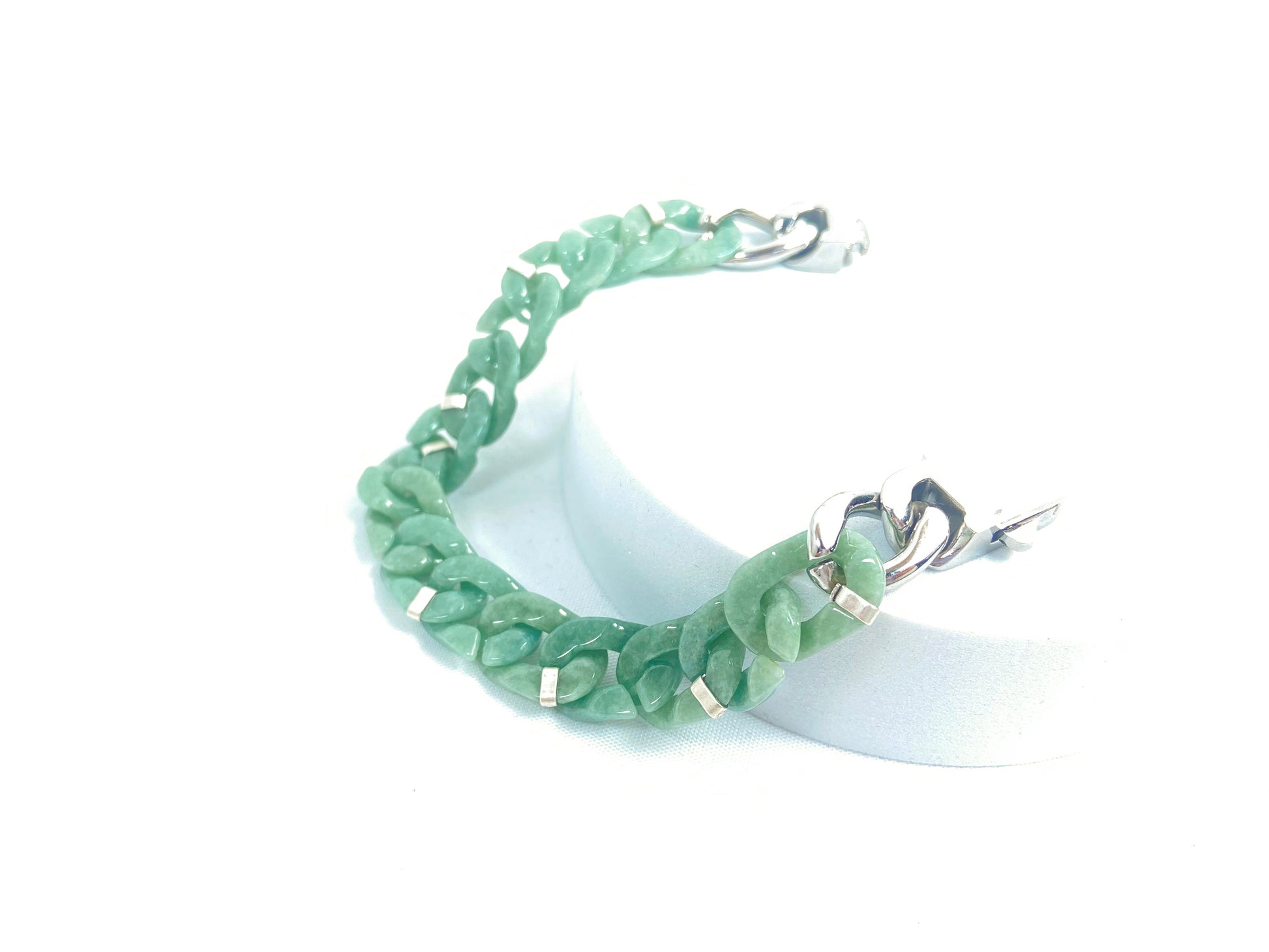 A Cuban chain bracelet made of aqua green jadeite.