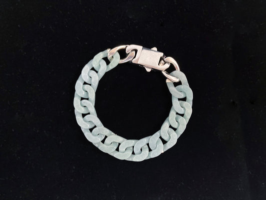 A light-blue jadeite bracelet crafted in the classic Cuban link style.