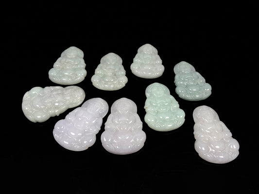 A purple green Guanyin blessing loose jadeite group.