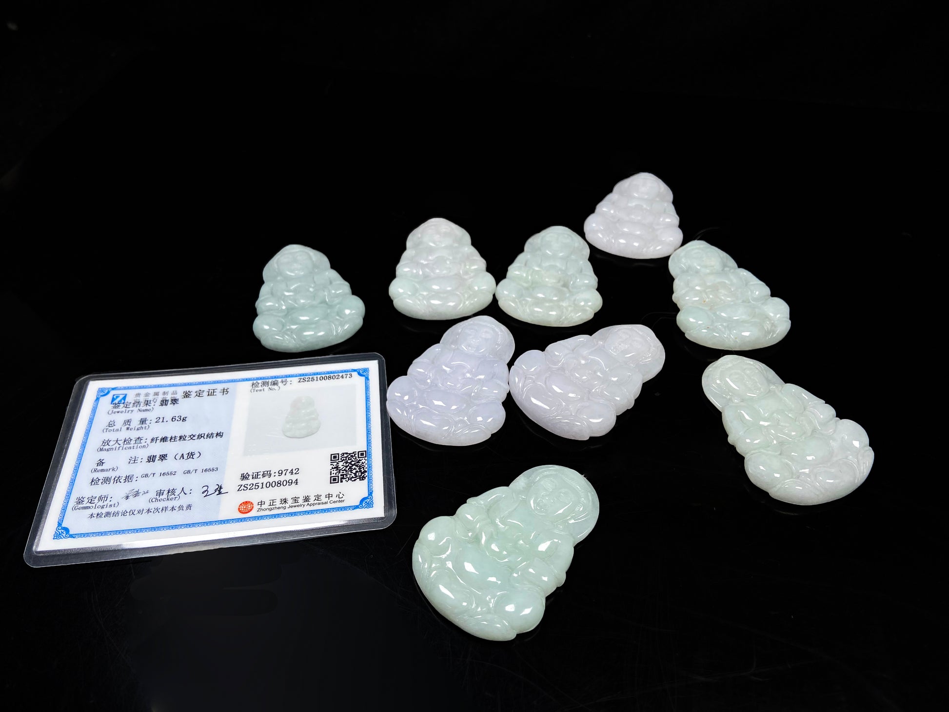 A purple green Guanyin blessing loose jadeite group.