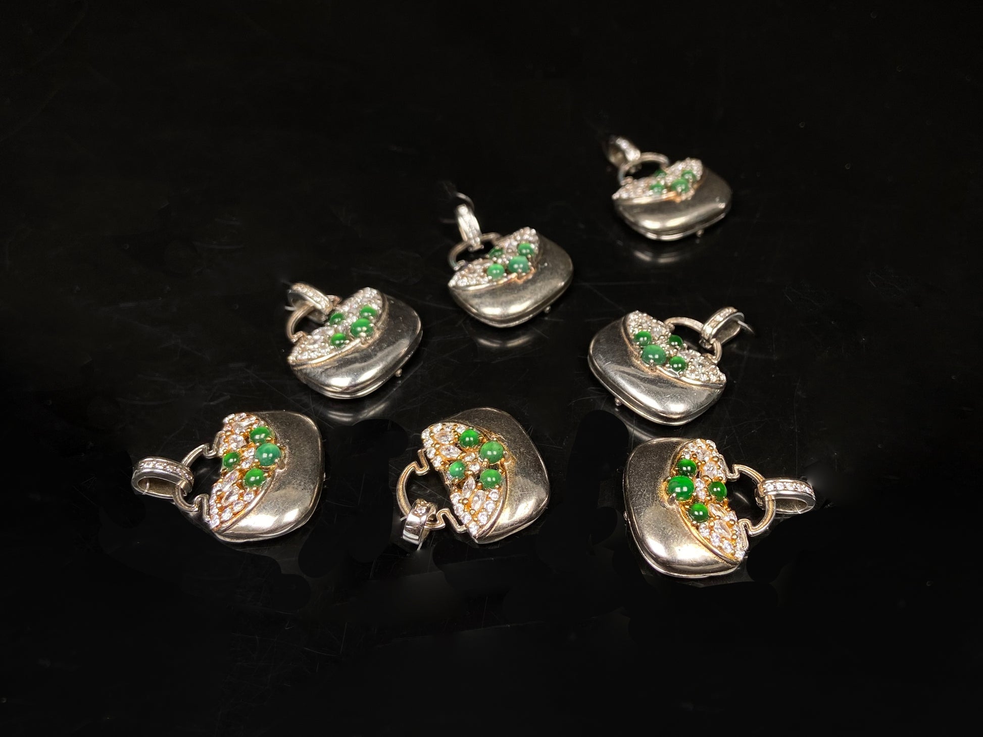 A green bead diamond bag jadeite pendant group.