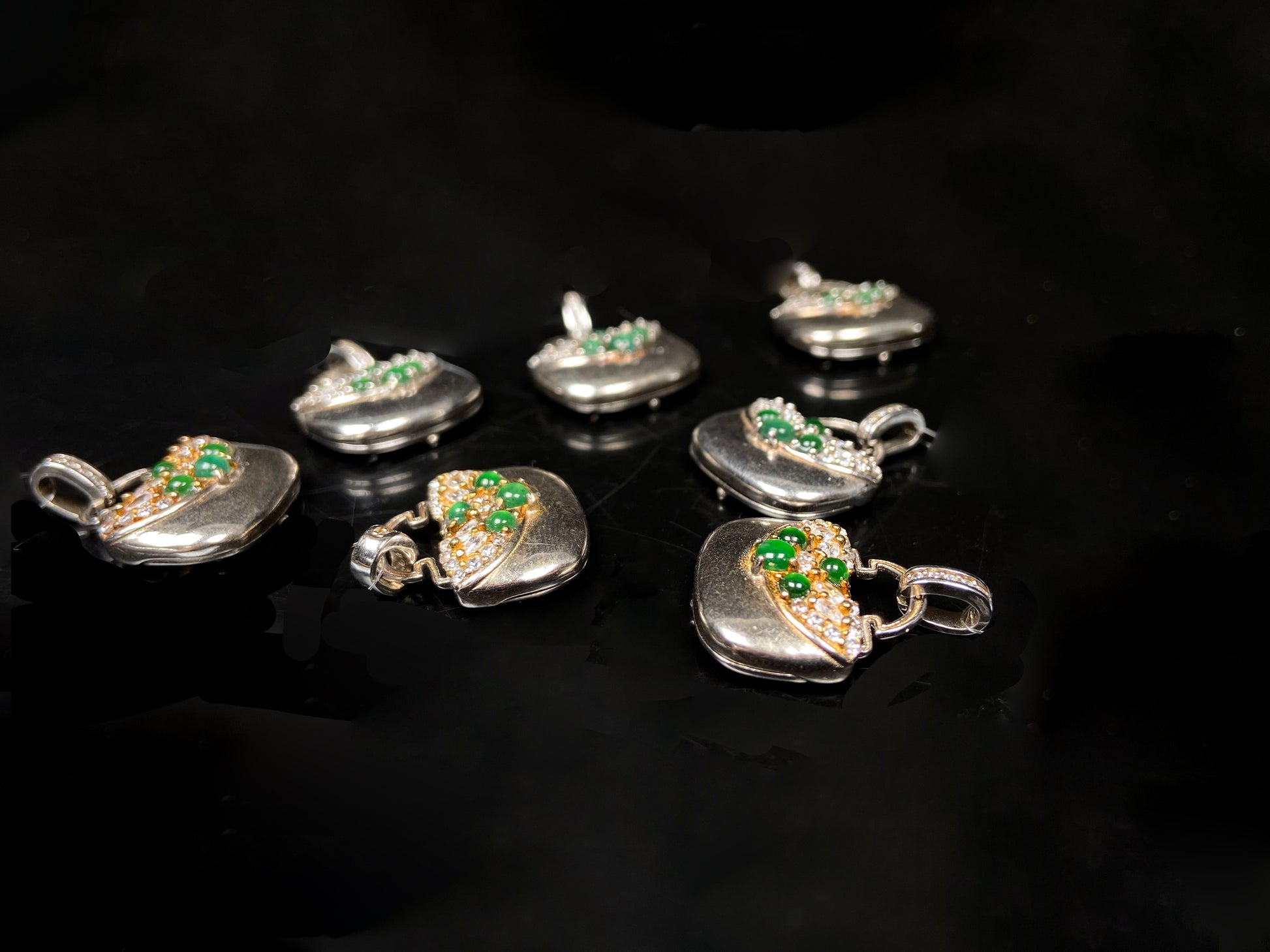 A green bead diamond bag jadeite pendant group.