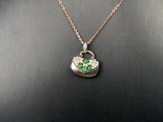 A green bead diamond bag jadeite pendant.