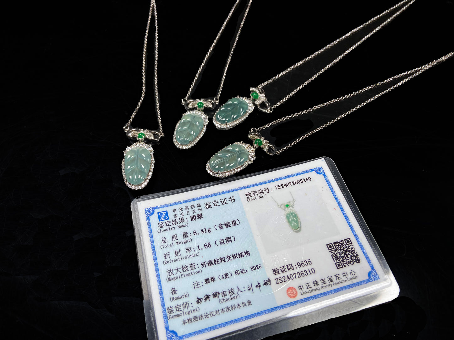 A lucky leaf with green bead jadeite pendant group.