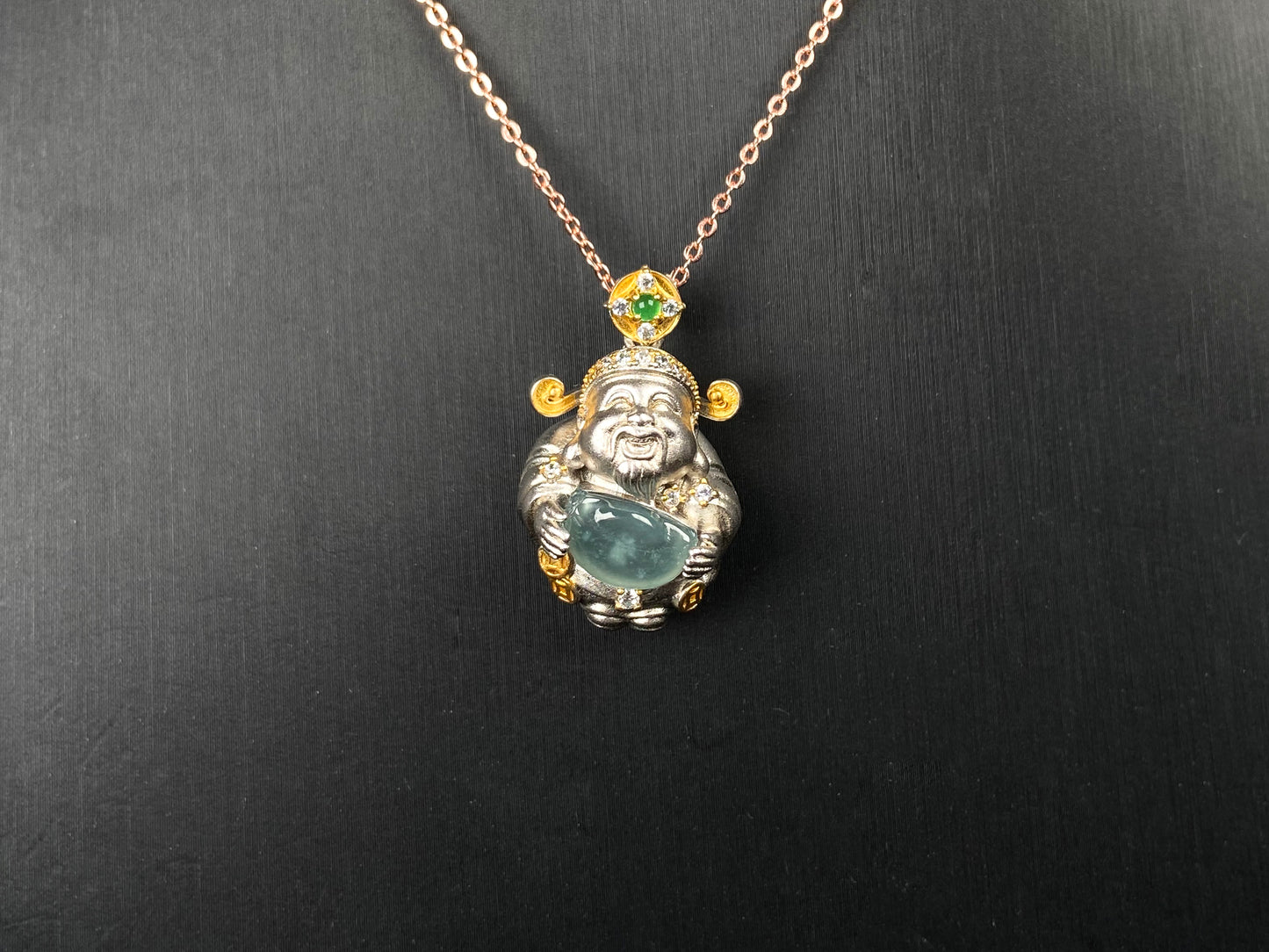A aqua ingot fortune god jadeite pendant.