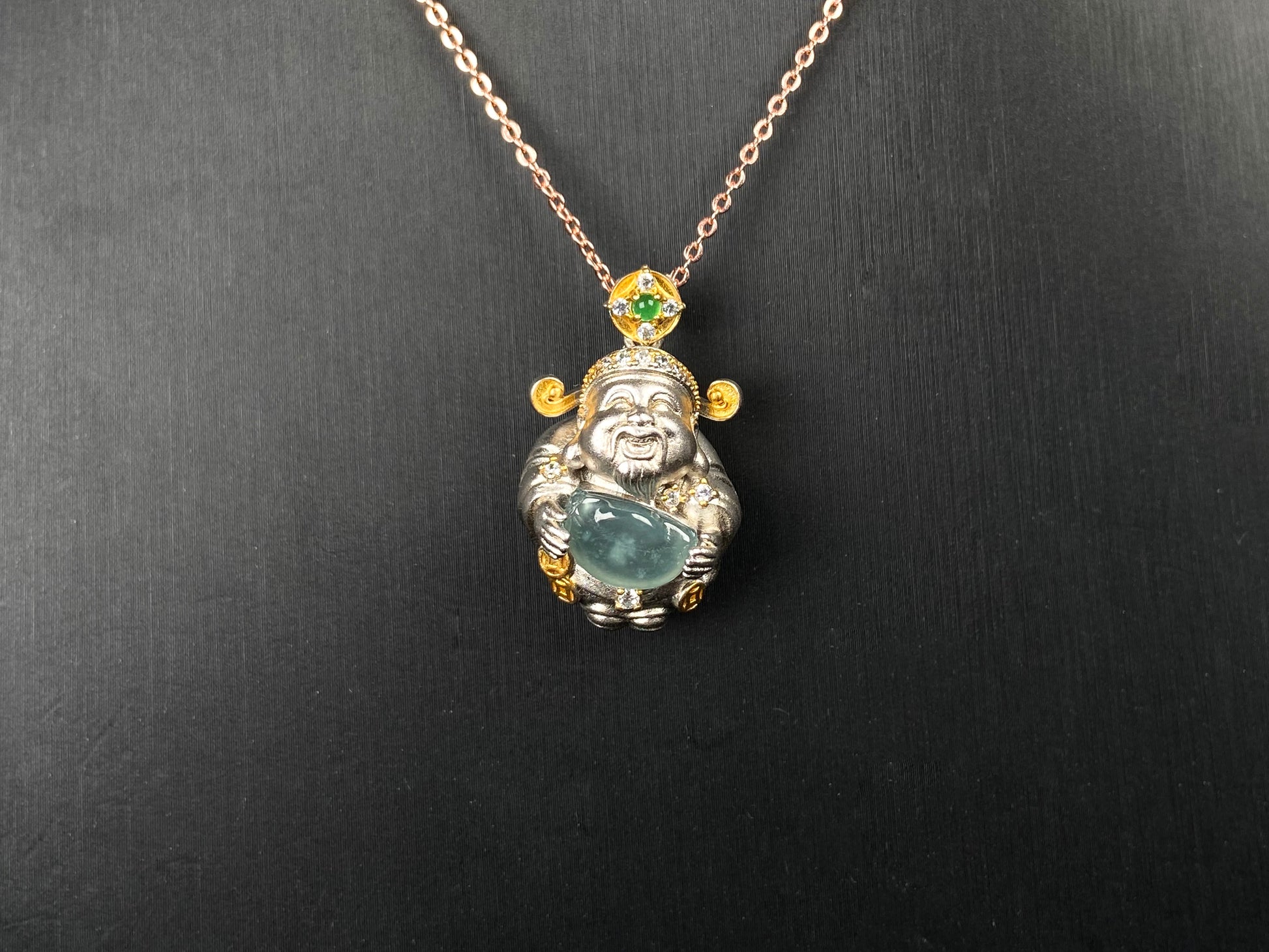 A aqua ingot fortune god jadeite pendant.