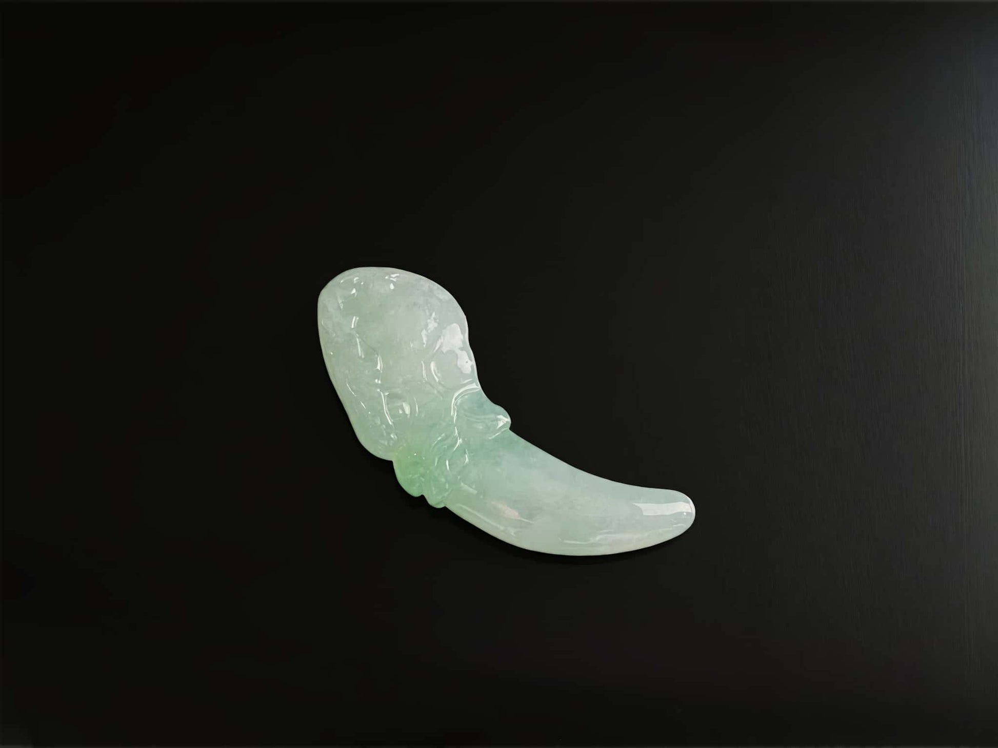 A mint lucky tusk loose jadeite.