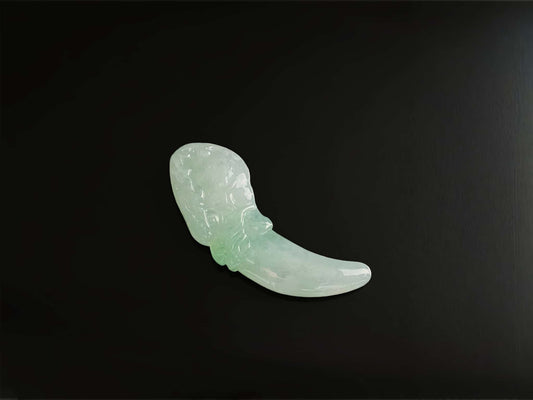 A mint lucky tusk loose jadeite.