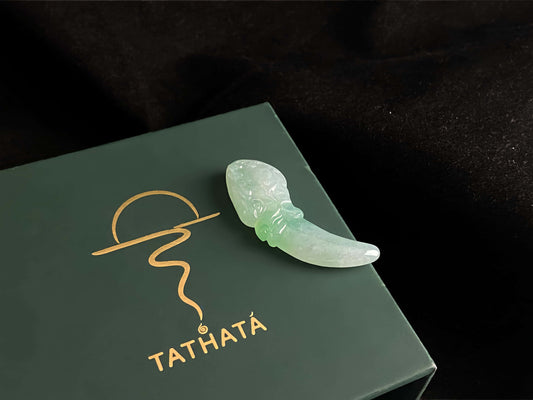 A mint lucky tusk loose jadeite.