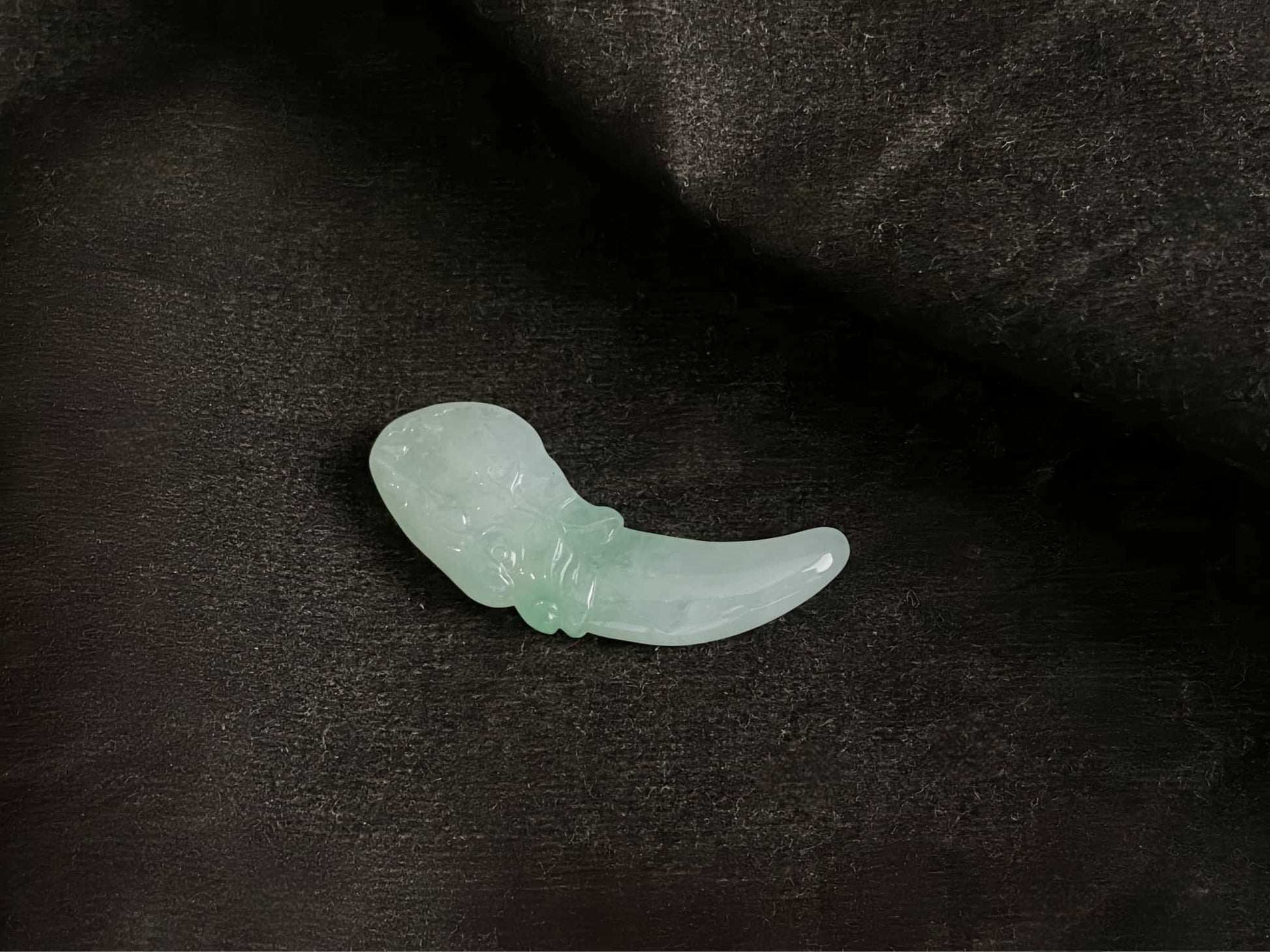 A mint lucky tusk loose jadeite.