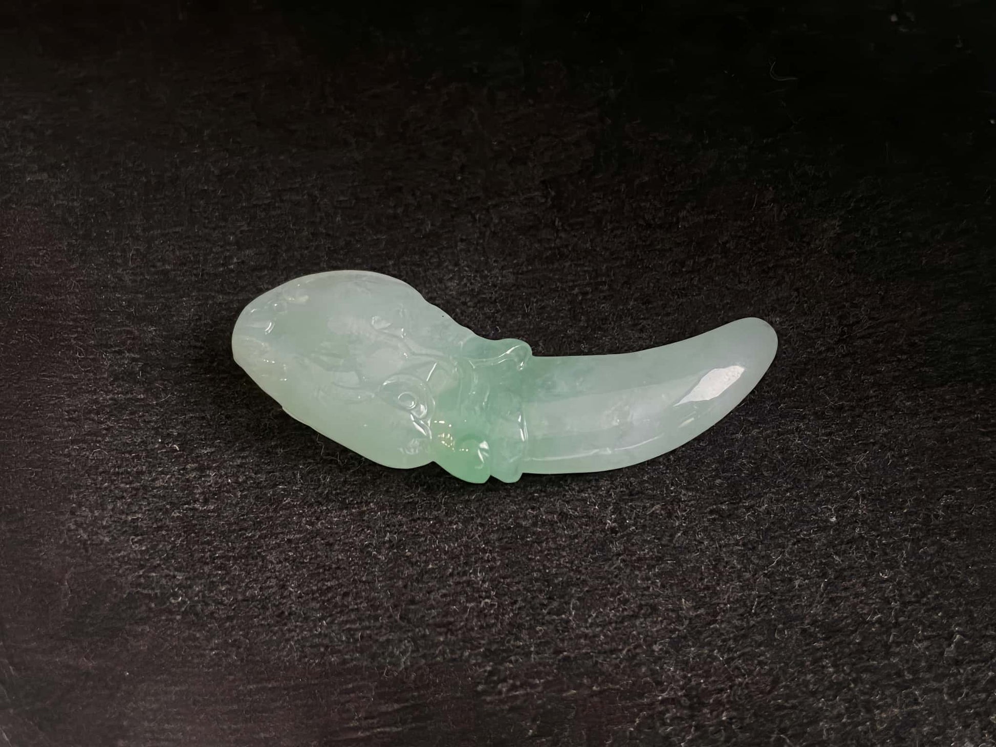 A mint lucky tusk loose jadeite.