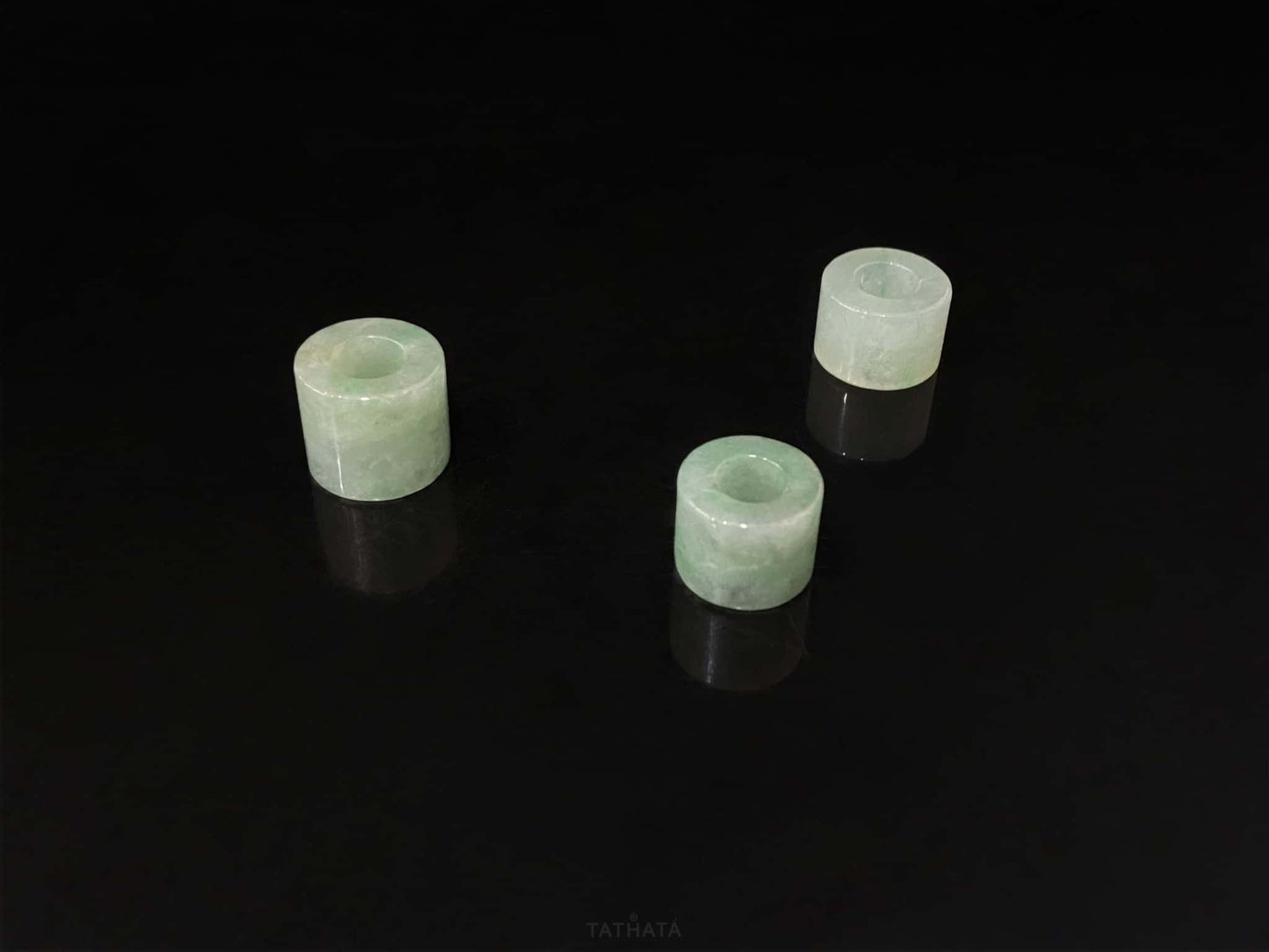 A dewy aqua barrel loose jadeite.