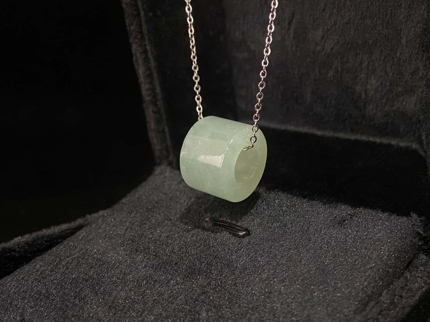 A dewy aqua barrel loose jadeite.