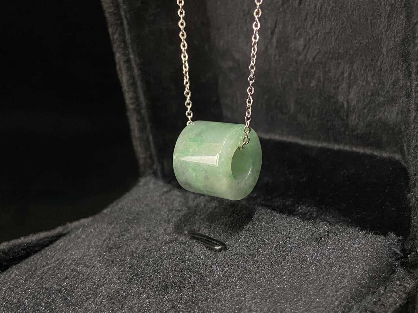 A dewy aqua barrel loose jadeite.