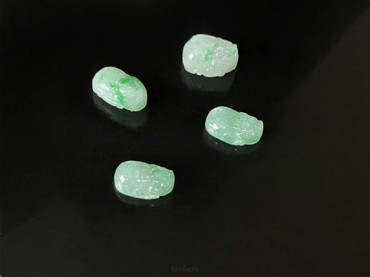 A green dot fortune Pixiu loose jadeite.