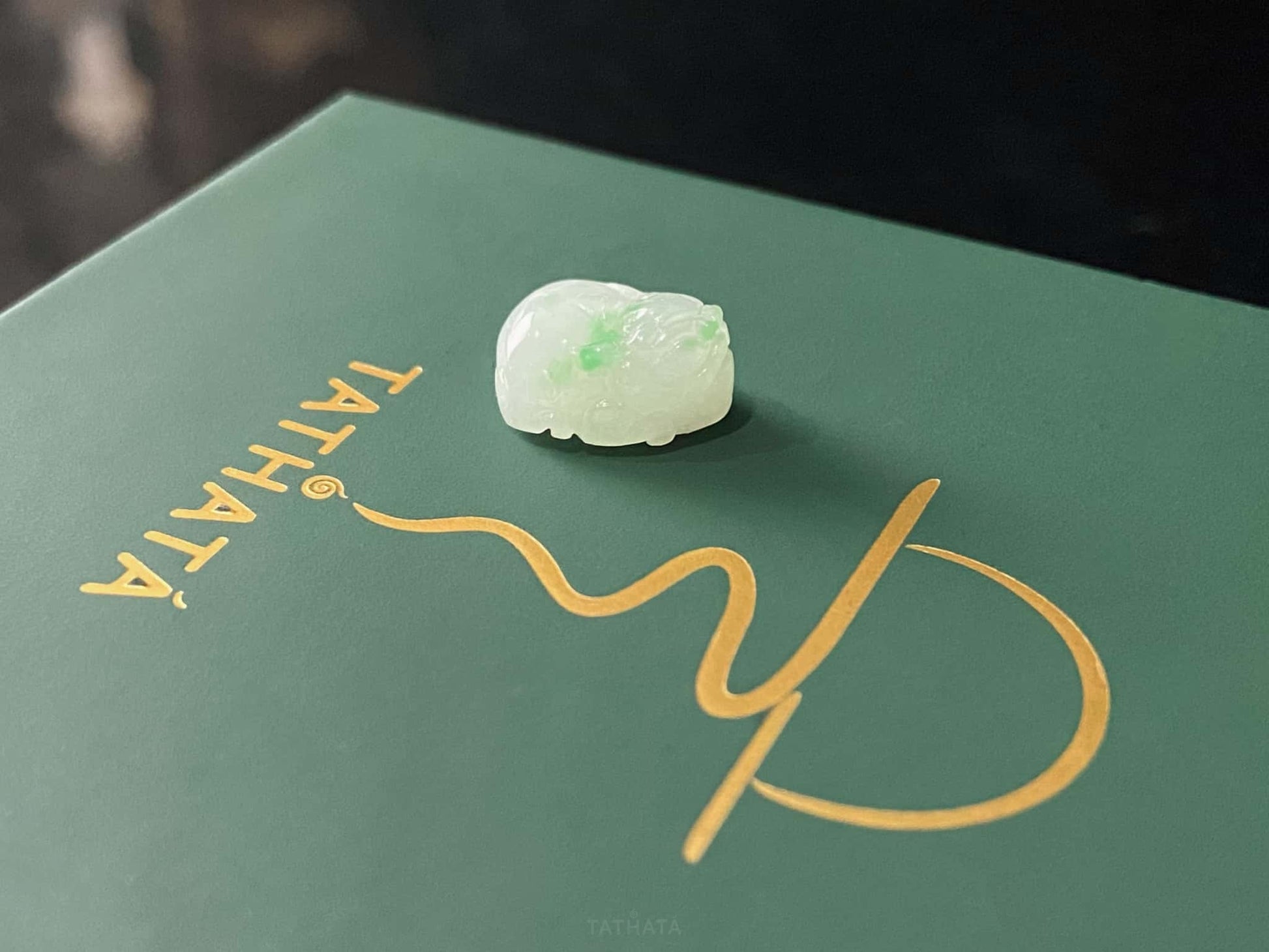 A green dot fortune Pixiu loose jadeite.