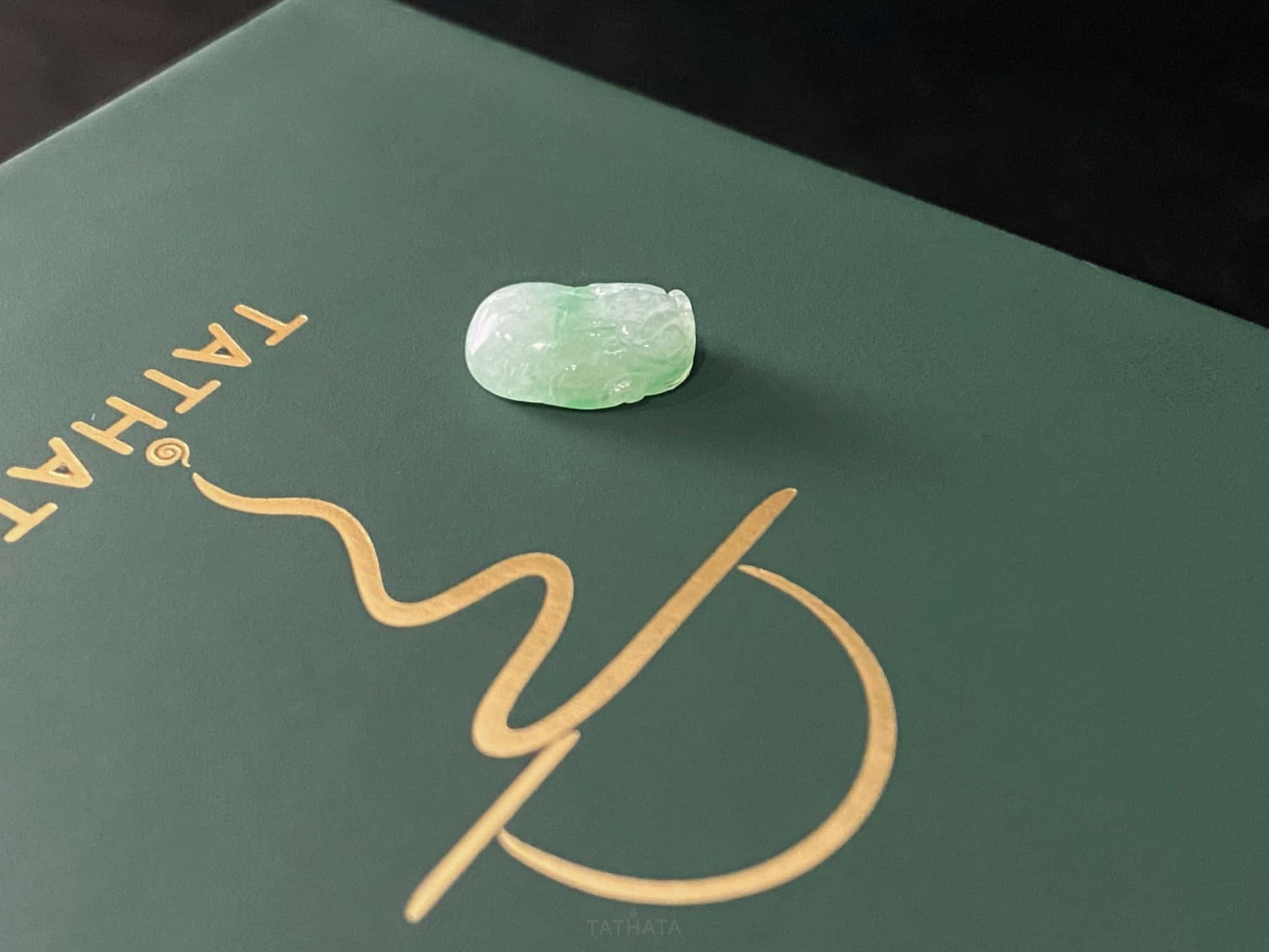 A green dot fortune Pixiu loose jadeite.